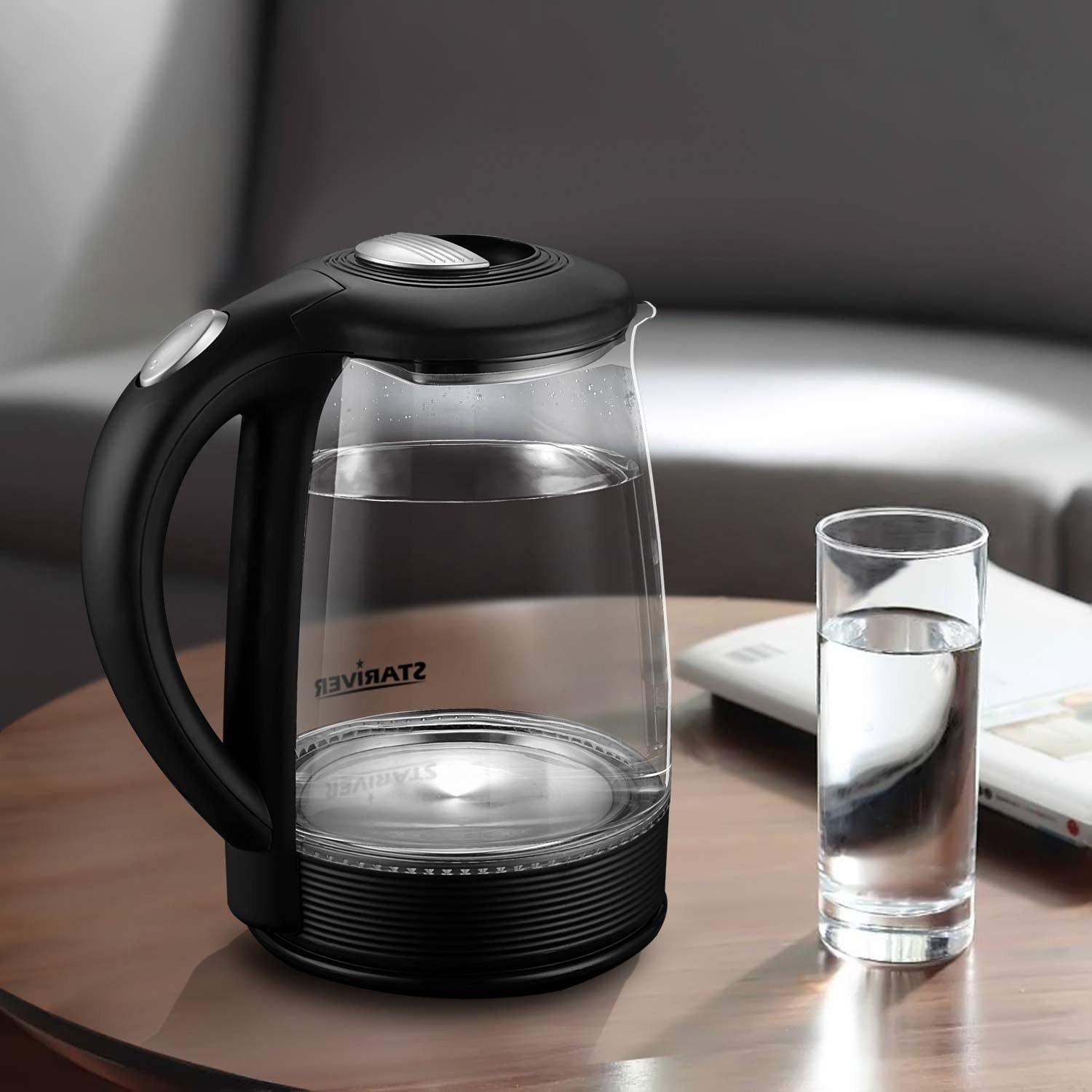 Stariver electric kettle with black and silver accents and a glass bottle