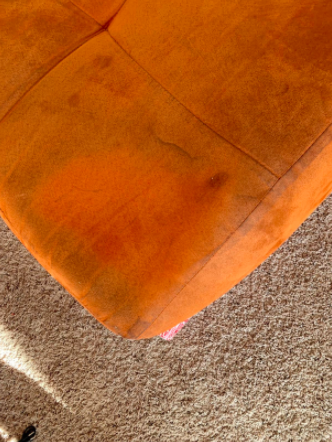 reviewer pic of brown suede couch cleaned with the cleaner