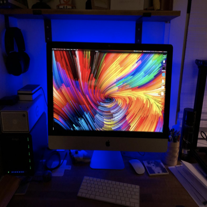 a reviewer's computer with the blue backlighting