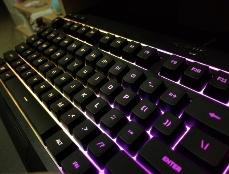 a black keyboard with rainbow back lighting