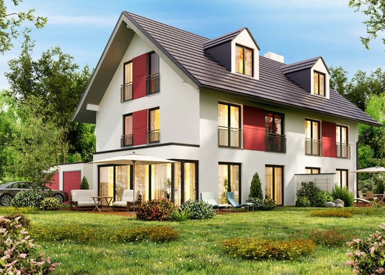 A tall home with LOTS of windows