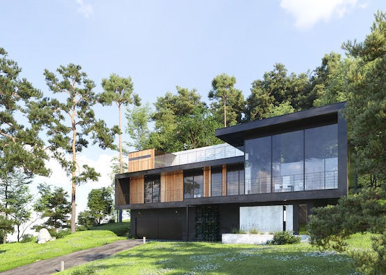 A modern style home with ceiling to floor length windows