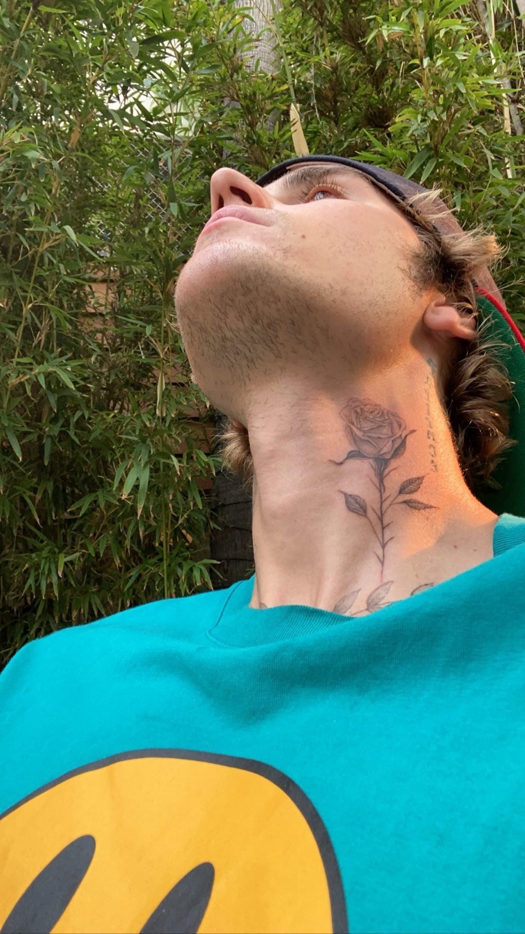Black Ink Rose Tattoo On Man Side Neck