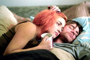 Clementine and Joel laying together in bed in Eternal Sunshine of the Spotless Mind