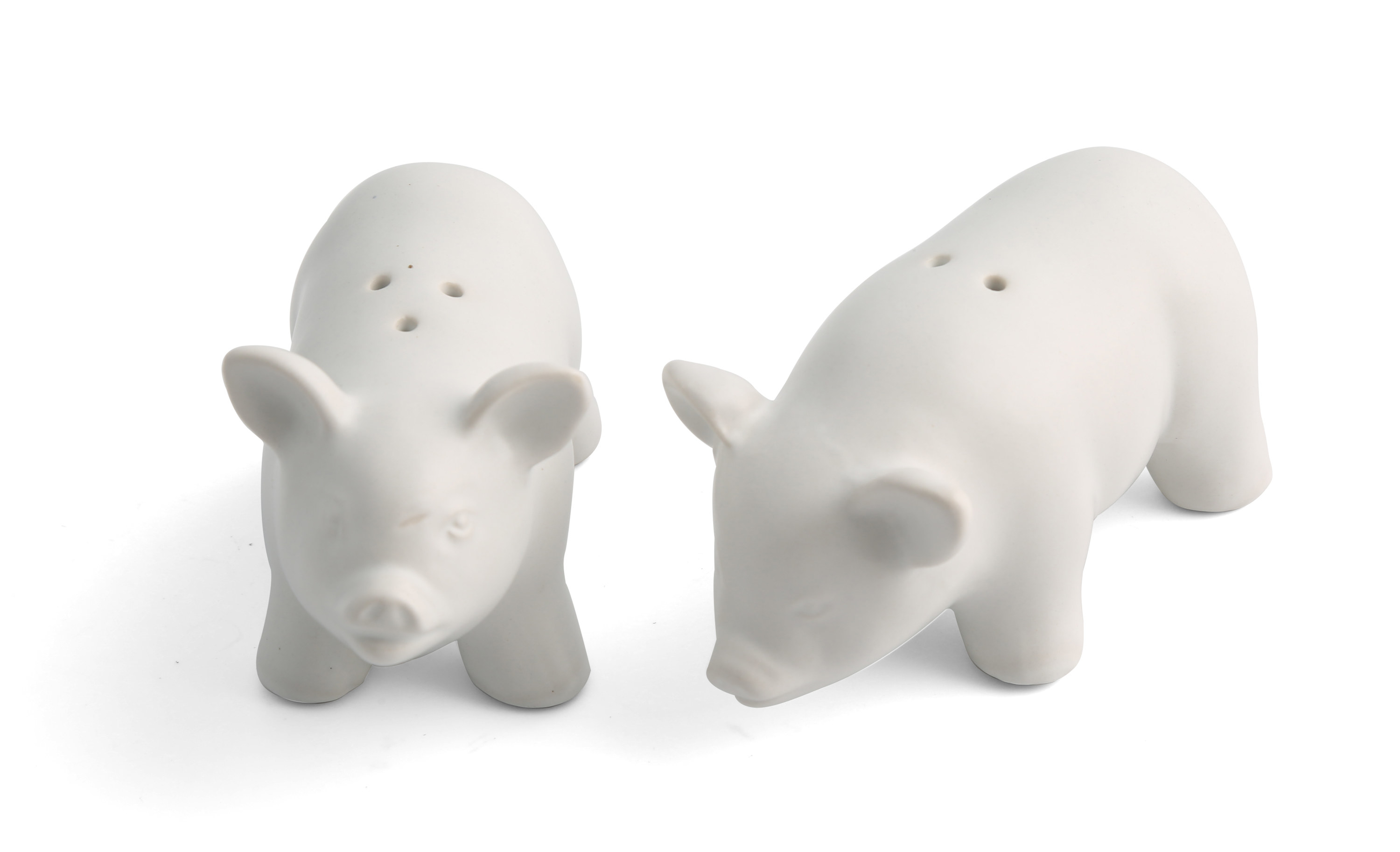 White ceramic pig-shaped salt and pepper shakers