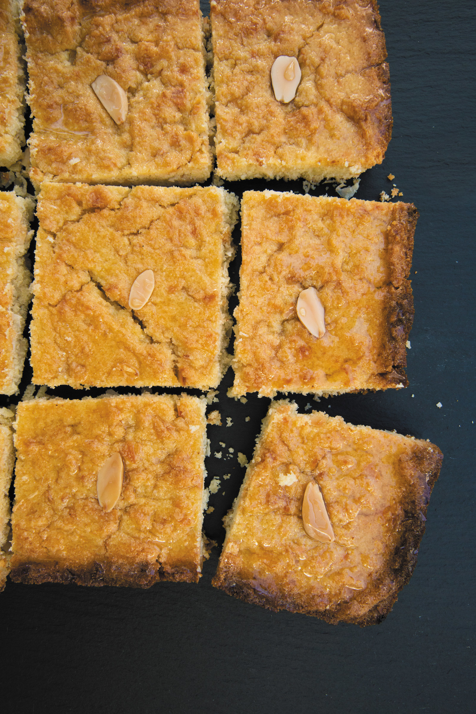 A photo of basbousa, a recipe from Mena&#x27;s mother featured in the book.