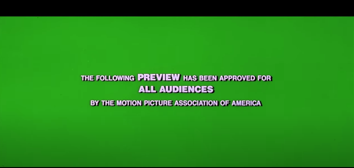 The green screen before a movie trailer starts, text says, &quot;The following preview has been approved for all audiences by the Motion Picture Association of America&quot;