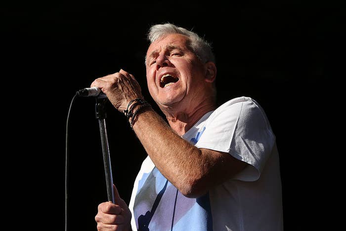 Daryl Braithwaite singing at a concert
