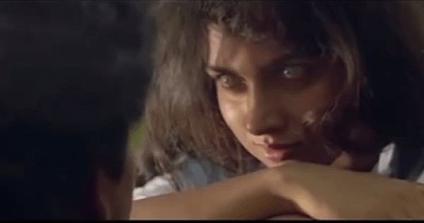 A possessed Revathi stares at her costar in the movie raat