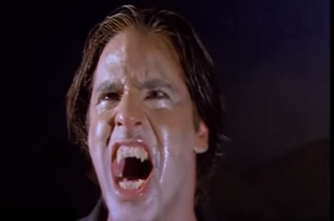 Rahul Roy screams as he morphs into a tiger in a still from the movie Junoon