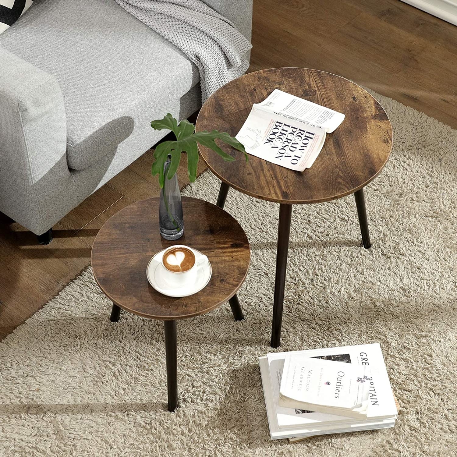 Two nesting end tables in the centre of a living room