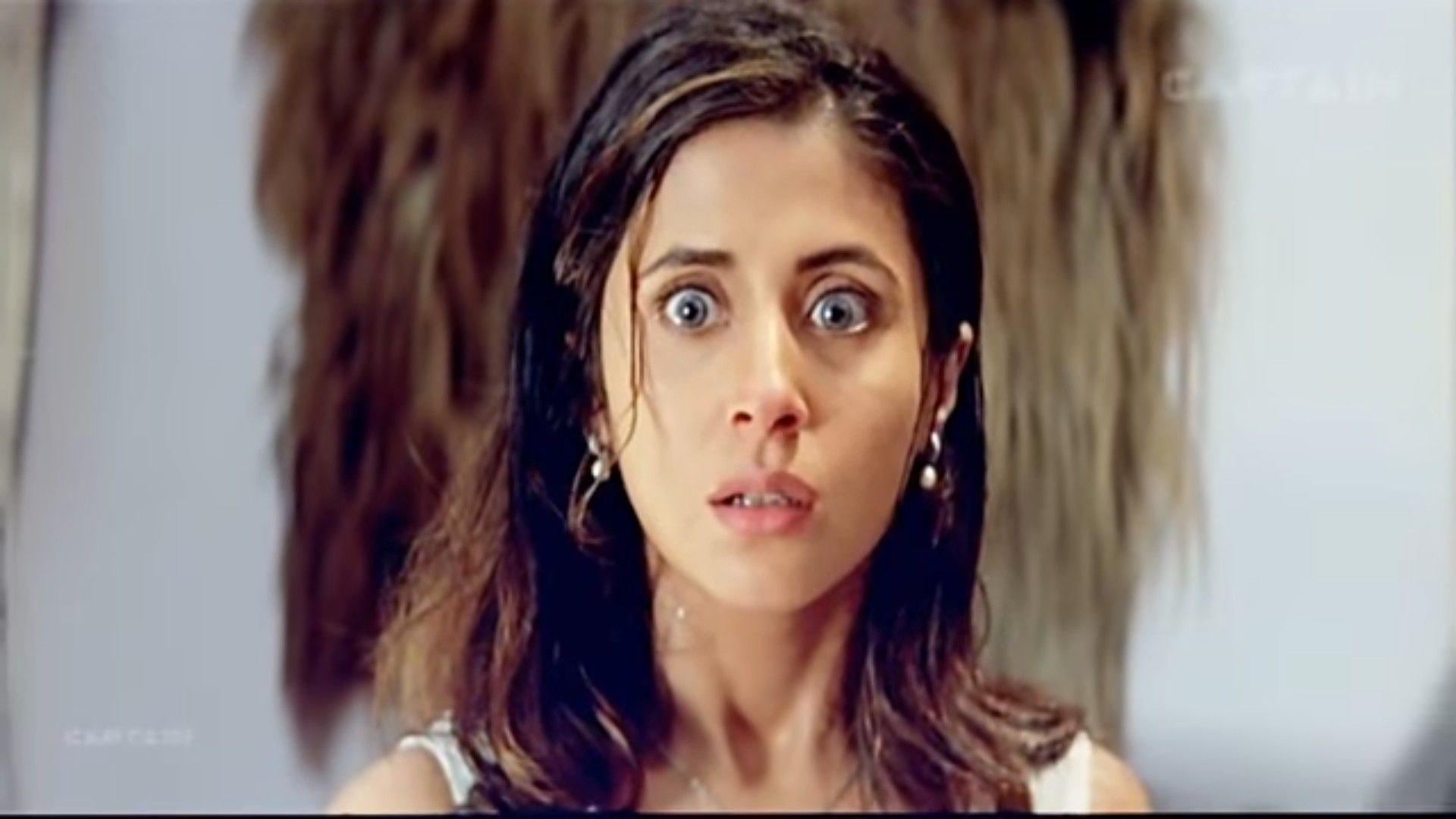 Urmila Matondkar looks shocked in a still from the movie kaun