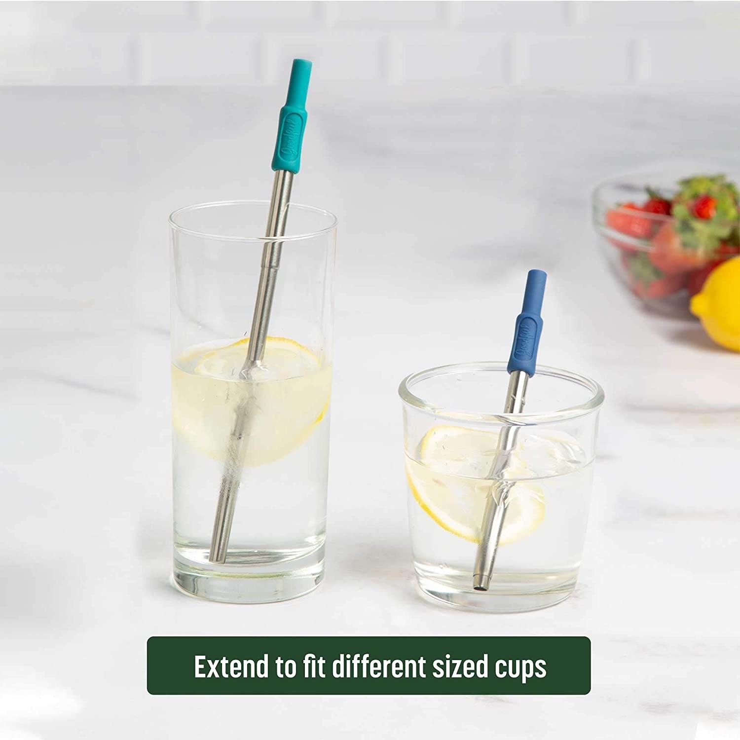 the metal straws with blue silicone tips placed in different sized glasses