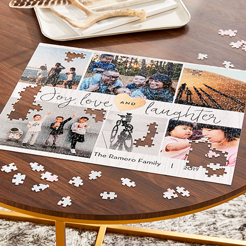 A custom jigsaw puzzle being put together on a coffee table.
