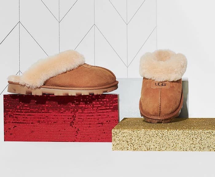 the tan slippers with a hard bottom and a furry lining around the edge