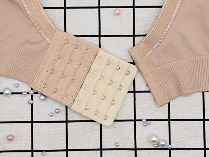A bra extender hooked into a bra