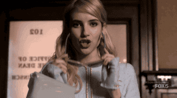 Gif of Chanel from &quot;Scream Queens&quot; wearing a fabulous outfit and putting on her sunglasses