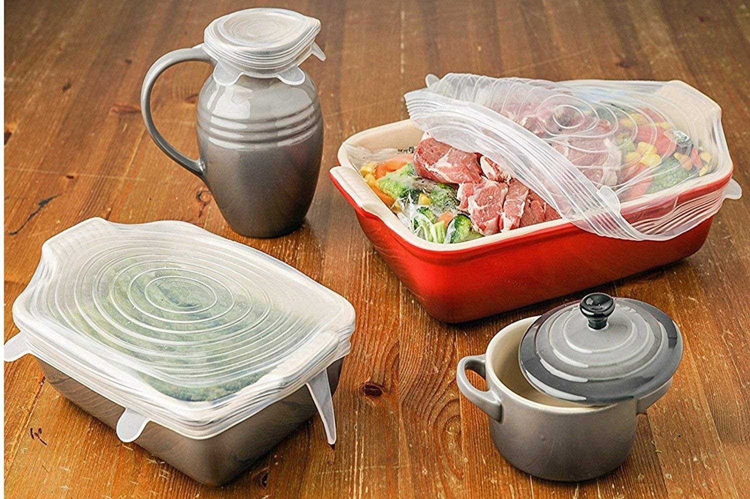 Various containers with stretchy lids over them
