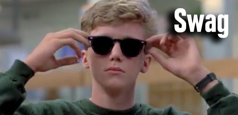 The nerdy kid from the Breakfast Club putting on sunglasses trying to be cool