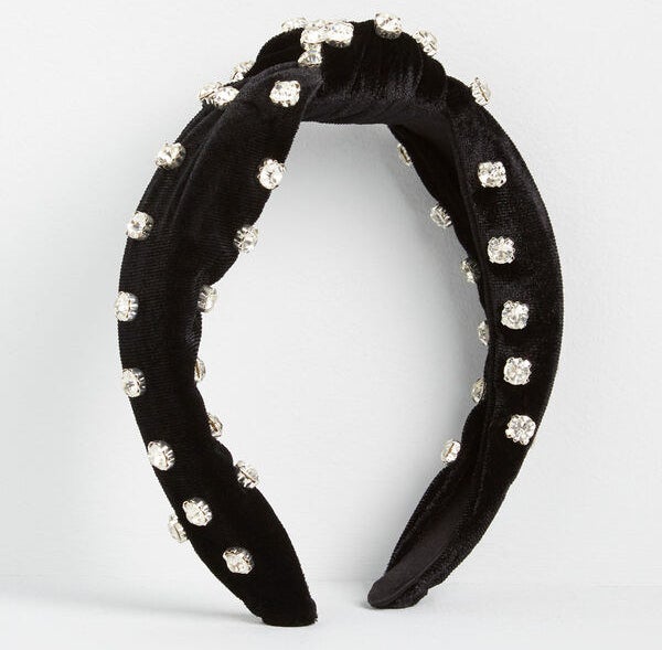 The black velvet knotted headband with gems embellished on it