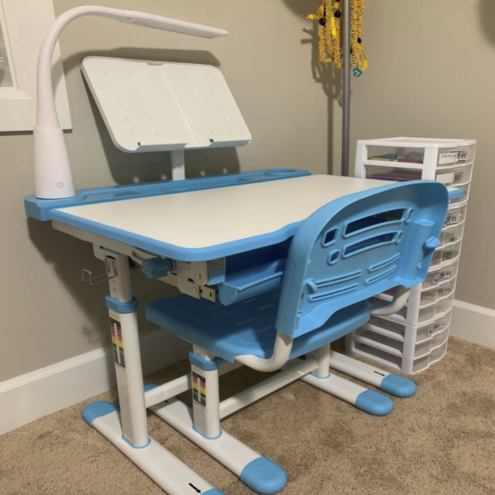 the blue and white version of the desk and chair sitting in a reviewer's room