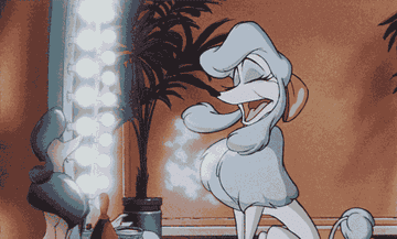 a gif of a poodle from oliver and company powdering herself in a mirror