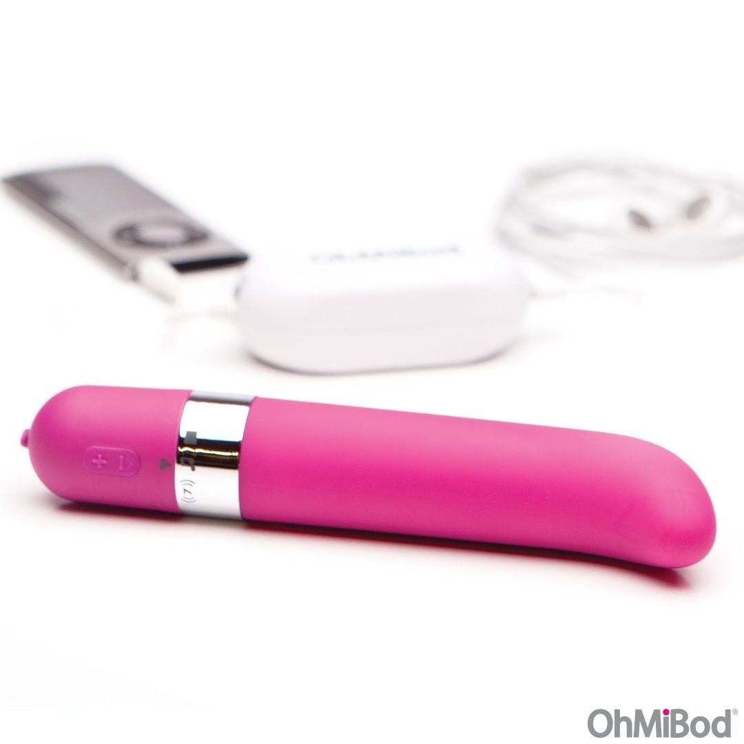 The pink vibrator with an iPod connected to the wireless transmitter in the back
