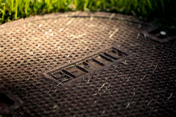 a photo of the lid of a septic tank