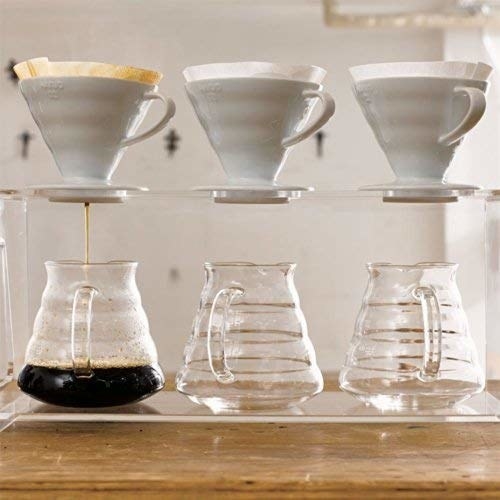 Coffee dripping into a jar from the dripper.