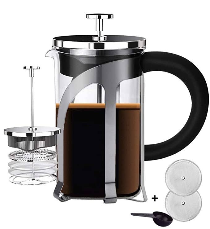 French press coffee maker with some coffee in it.