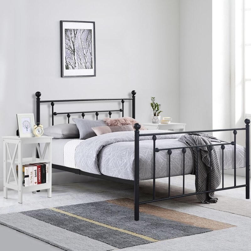 A black iron bed frame