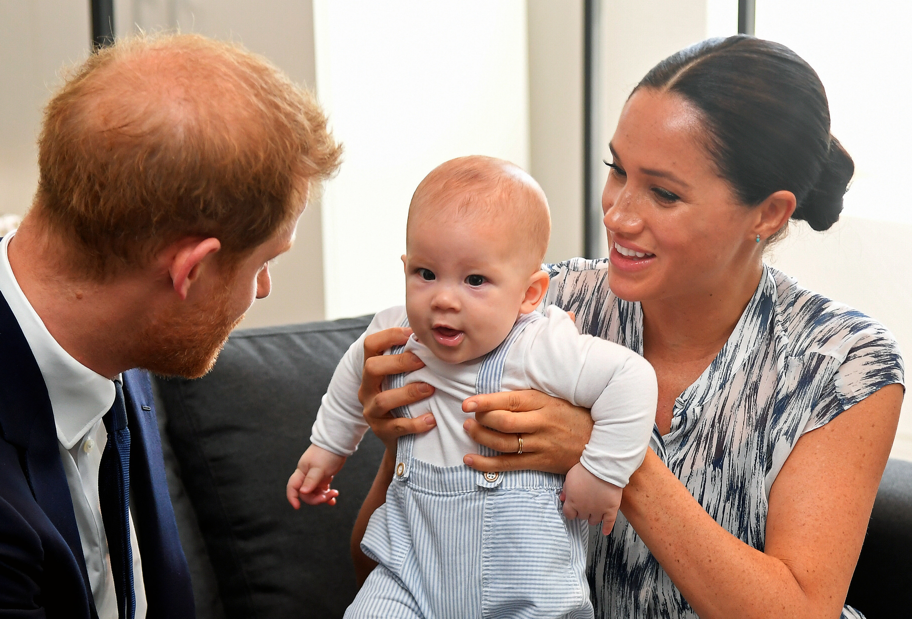 Meghan Markle holding baby Archie up
