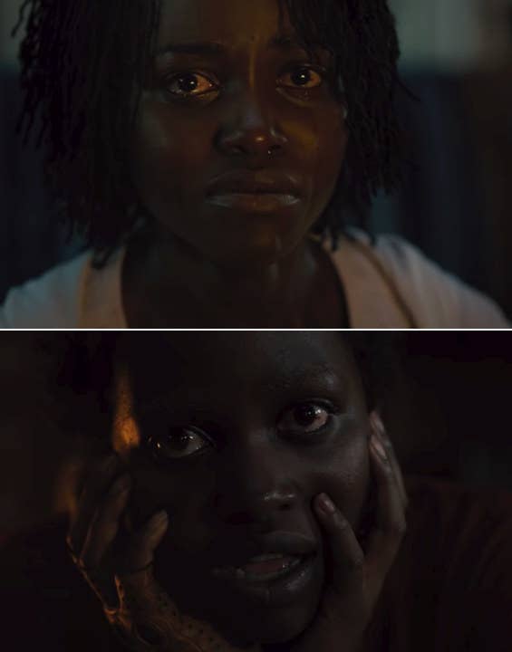 Adeline staring terrifyingly at Red in the cabin while Red holds her face