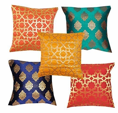 Multi-coloured cushion covers with golden patterns on them