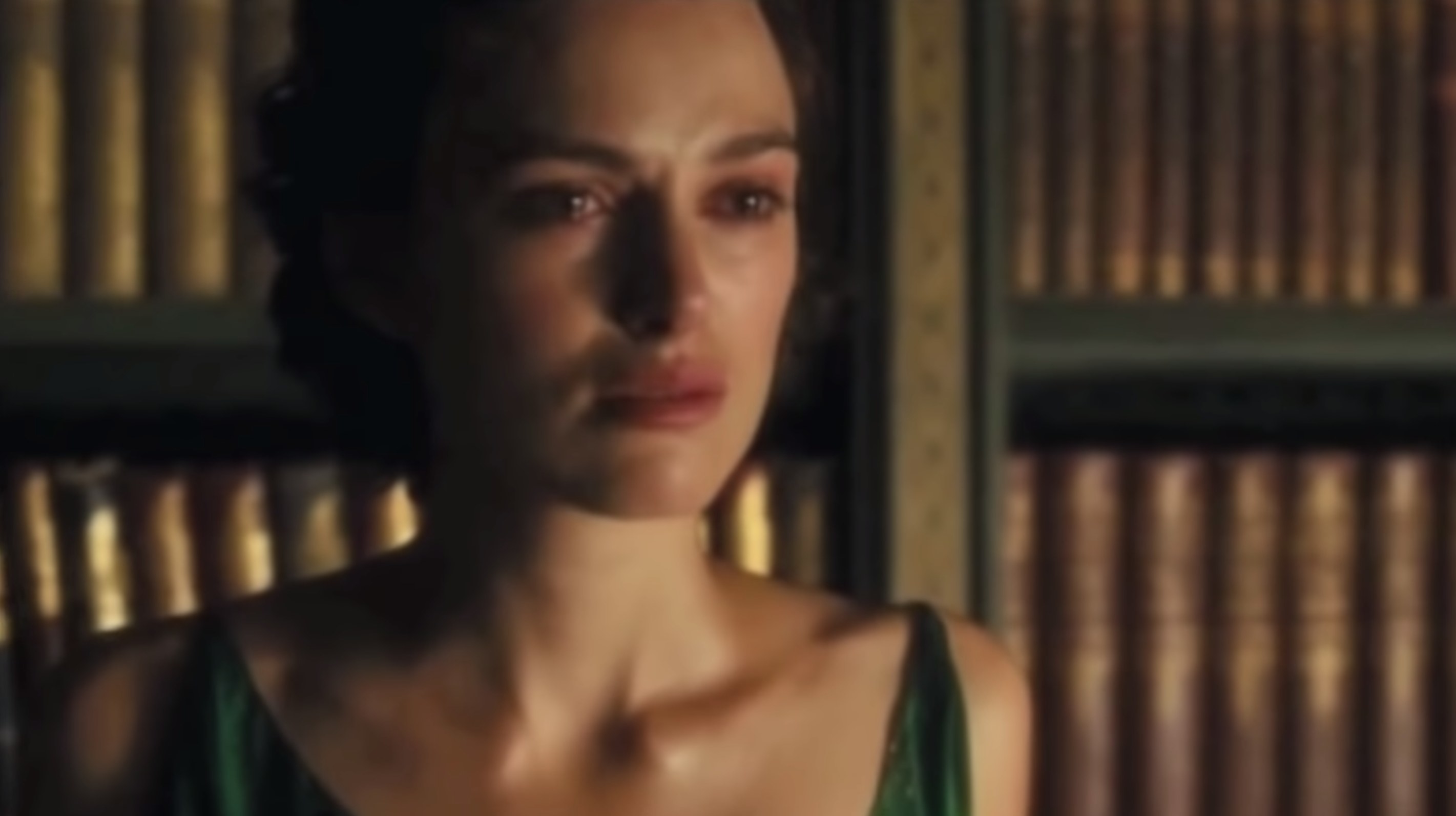 A woman played by Keira Knightley crying