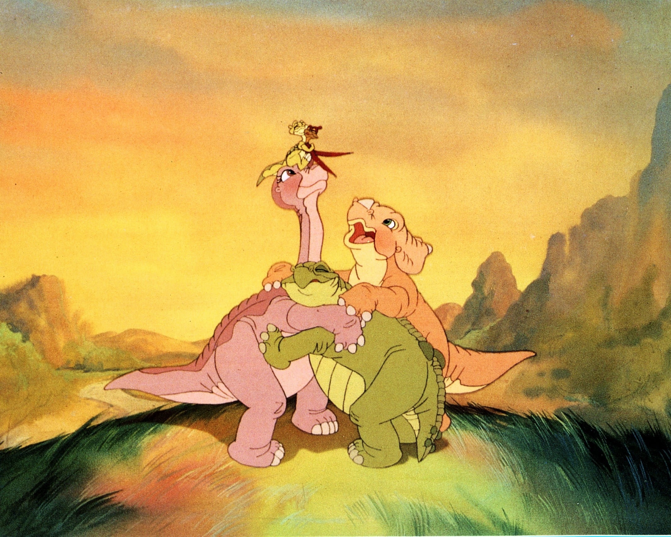 The dinosaur friends from &quot;The Land Before Time&quot; have a group hug