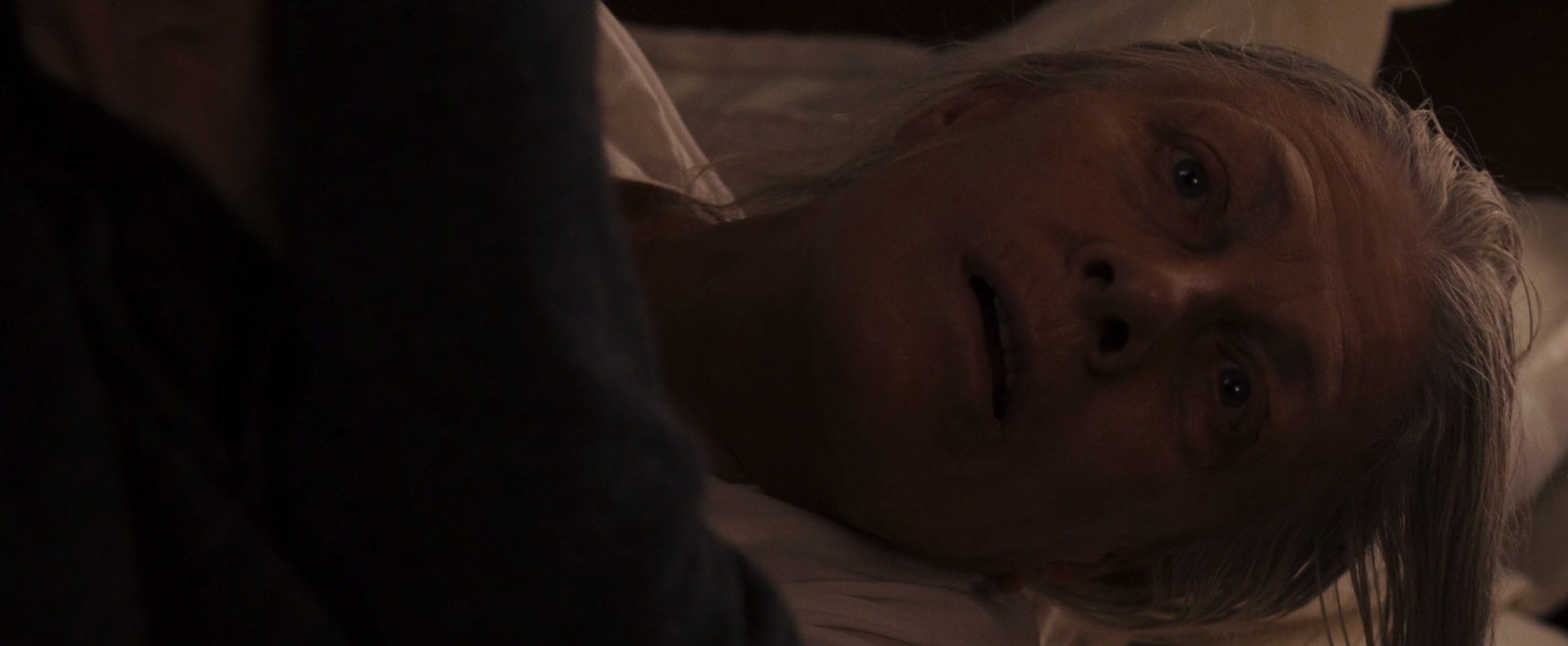 An old woman in her death bed