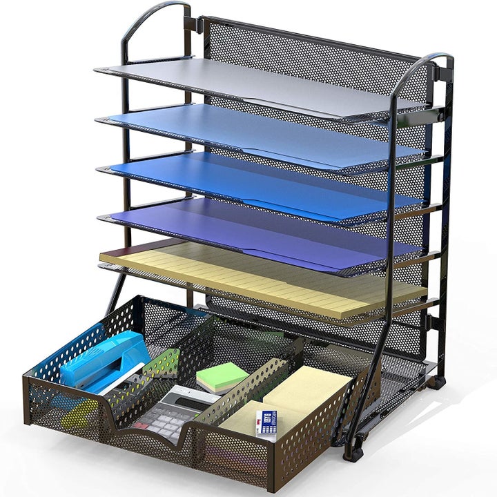 The organizer with five shelves and a three-compartment drawer holding files, paper, and utensils