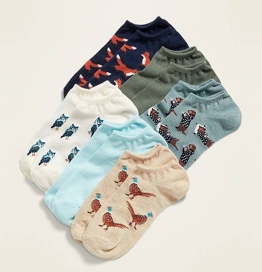 A set of six pairs of socks featuring a variety of colors and cute critters