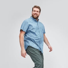 model wearing Riviera short sleeve shirt in chambray flamingos