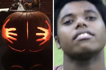 Guy looking sexually at a pumpkin that looks like spread butt cheeks.