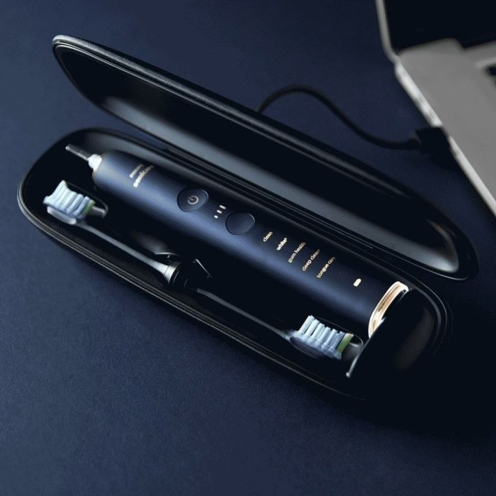 A Philips toothbrush in its charging case