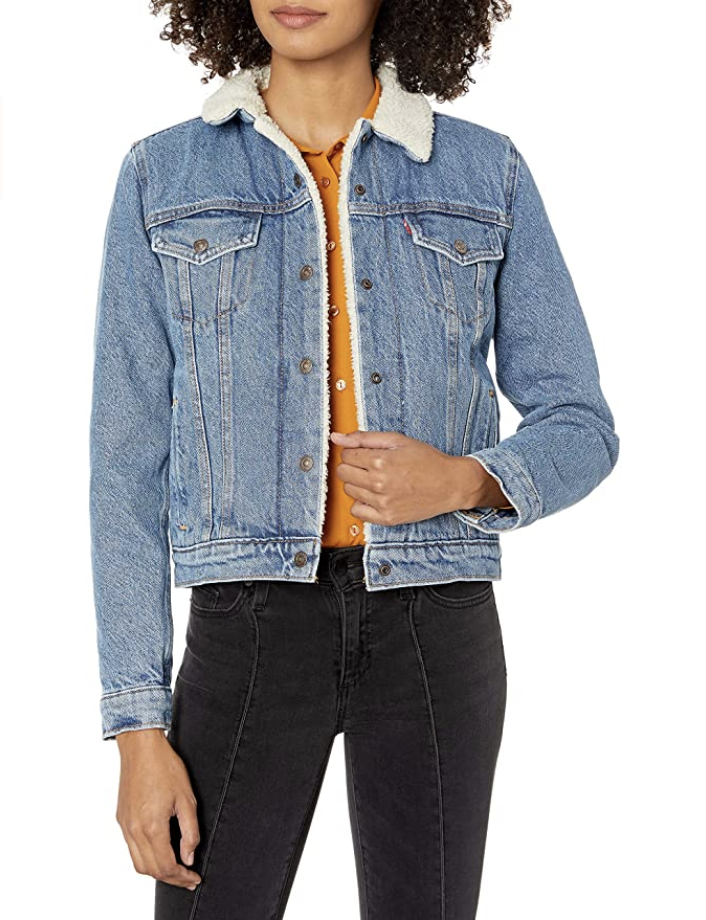Model in denim jacket with sherpa lining