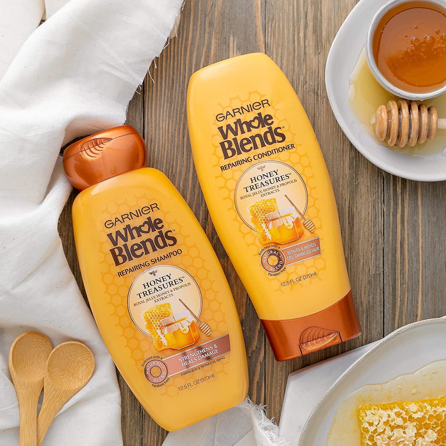 the yellow and orange bottles of shampoo 