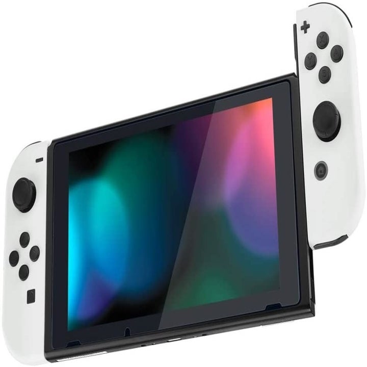 a nintendo switch with white controller covers