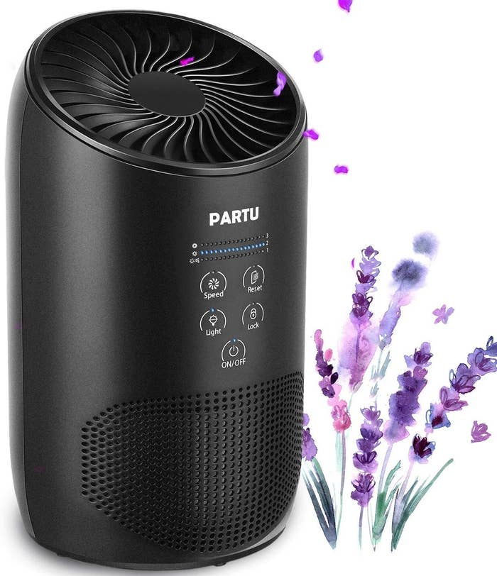 Black air purifer with several speed and light settings 