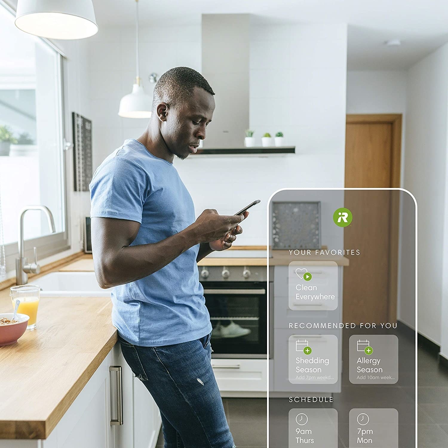 A person using the app to set up their Roomba