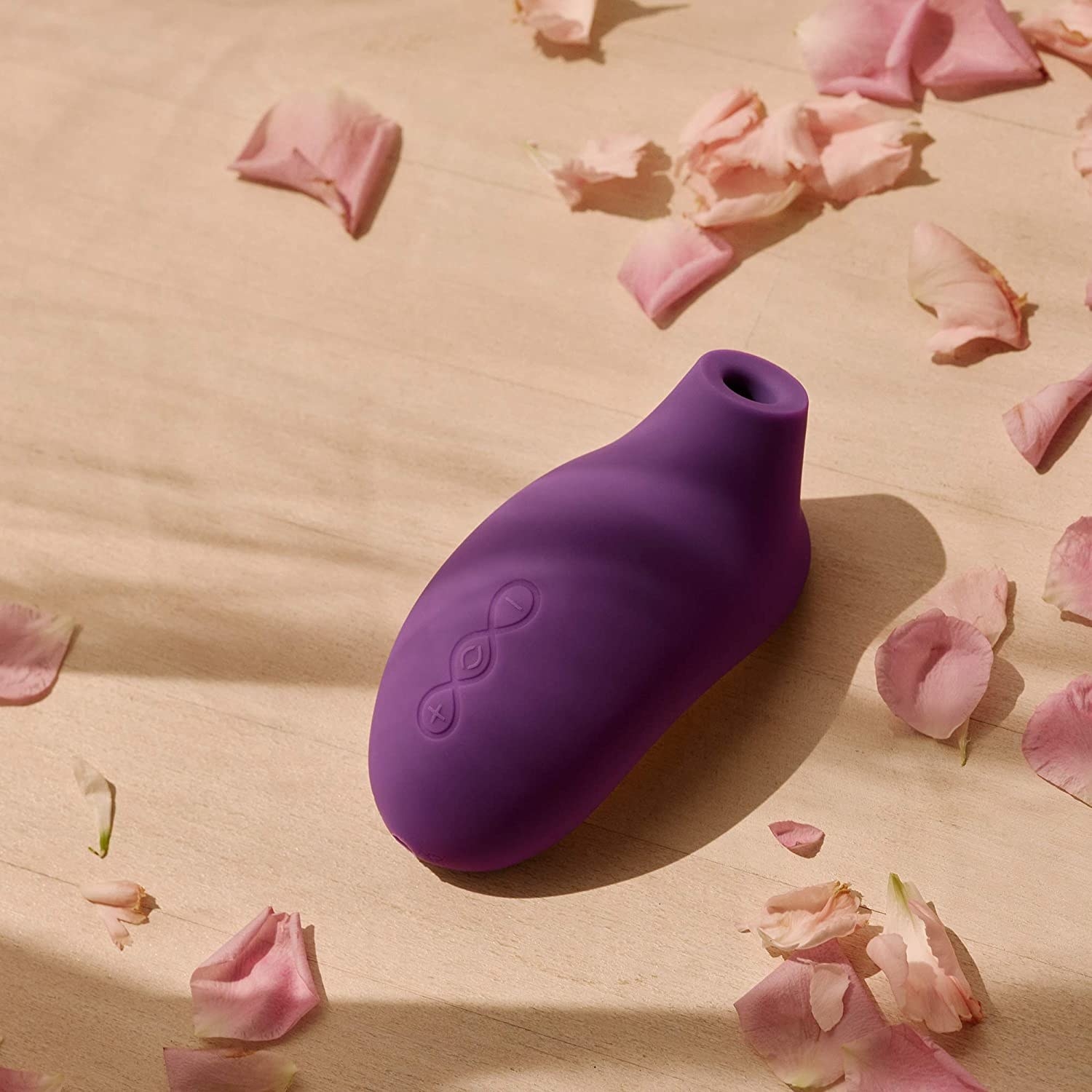 The vibrator surrounded by rose petals