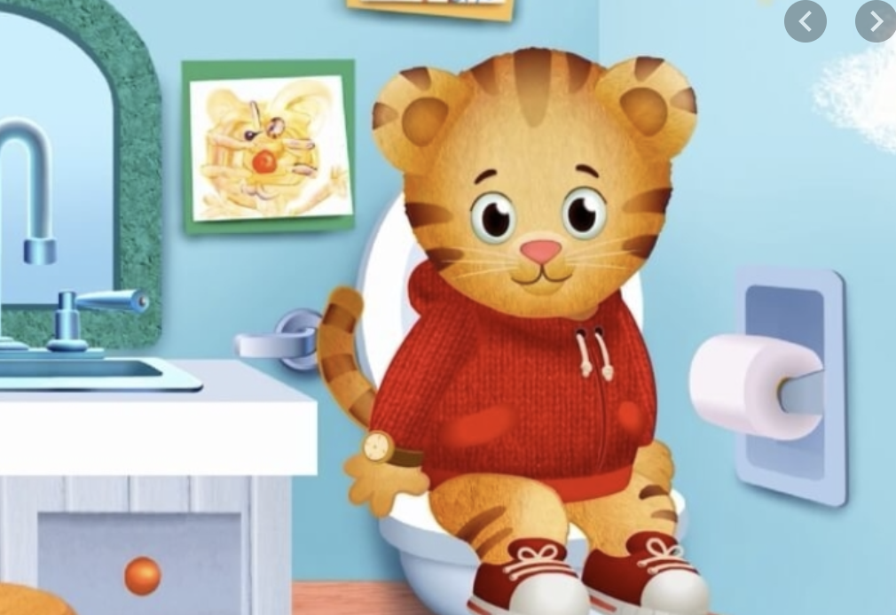 Daniel Tiger sitting on the potty.