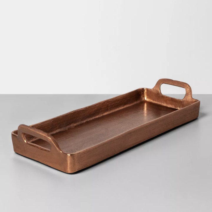 a close up of the copper rectangle tray